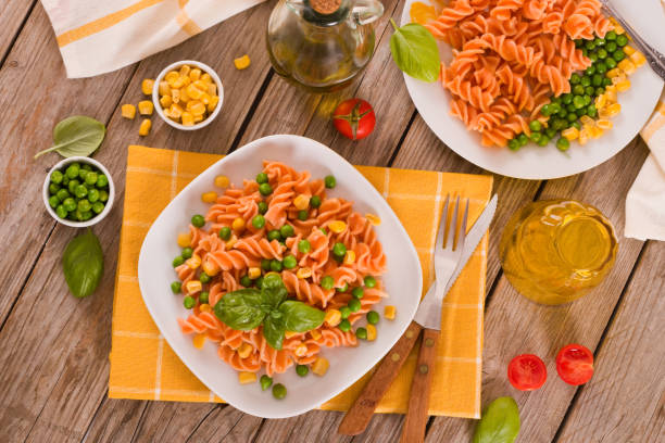istock Fusilli pasta with peas and sweet corn. 1326440991