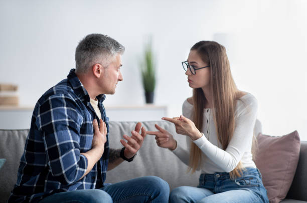 istock Mature married couple fighting, blaming and accusing each other, having relationship problem at home 1326441975