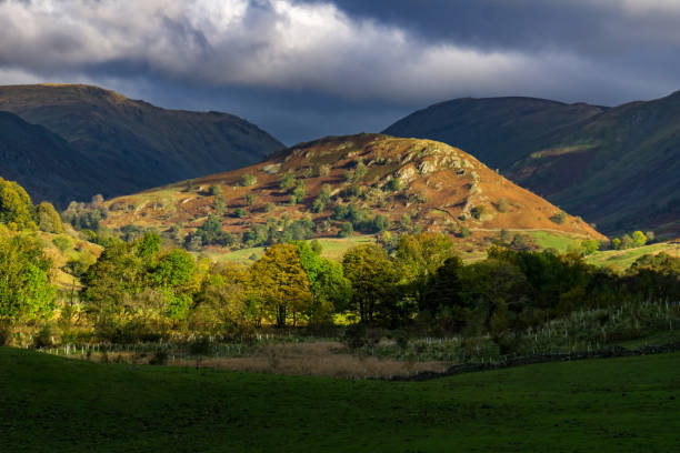 istock Vibrant Sunlight On English Lake District Fell 1326442029