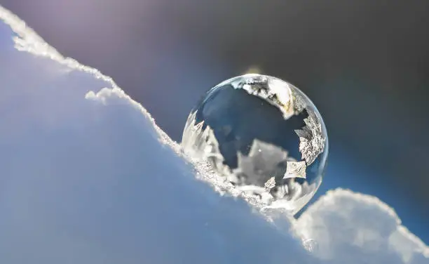 Macro of a frozen soap bubble.