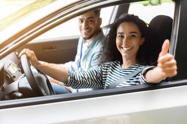 istock Arab man instructor examinating happy lady student 1326446289