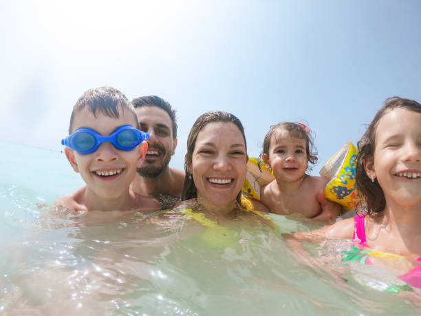 istock Young family enjoying vacation 1326449295