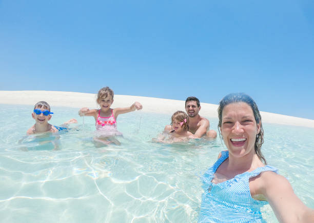 istock Young family enjoying vacation 1326449506
