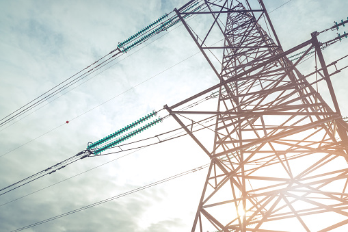 Electricity delivered by high voltage power cable across Roskilde Fjord in Denmark. Electricity is a new synonym to the Global Sustainable Development Goals.