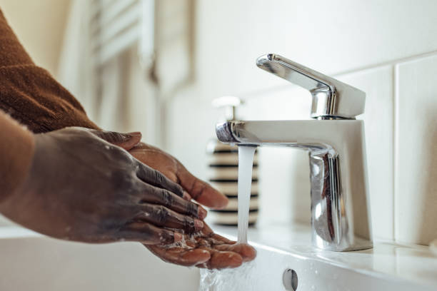 istock Adult man, washing his hands after using the bathroom. 1326451006