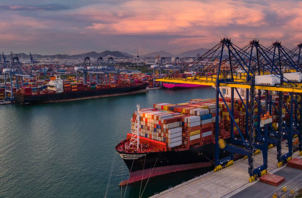 istock Container ship in export and import business and logistics. 1326451078
