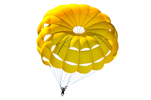 A bright yellow parachute on white background.