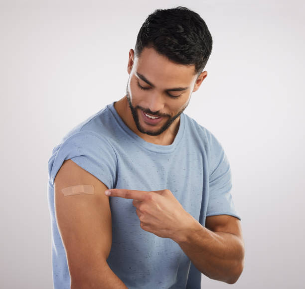 istock Shot of a handsome young man sitting alone in the studio after getting vaccinated 1326452807