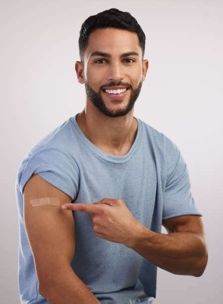 istock Shot of a handsome young man sitting alone in the studio after getting vaccinated 1326452810