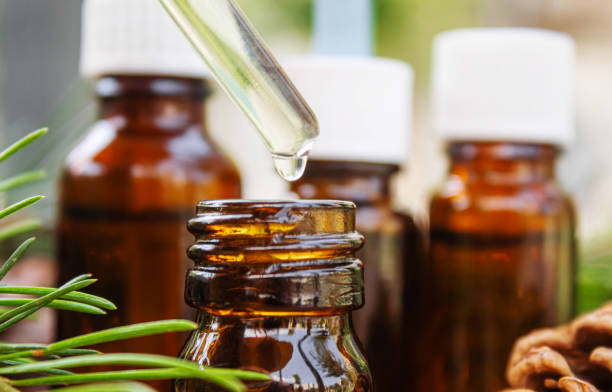 istock Fir tree essential oil in small bottles. Selective focus 1326459391