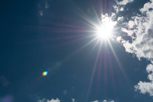 istock sun shining above beautiful stormy clouds, sky is clearing after rain 1326462762