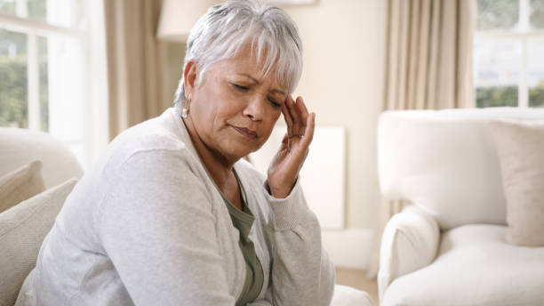 istock Shot of an elderly woman experiencing a headache 1326465728