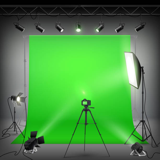 istock Professional photo studio interior. Photography tripods and racks and paper roll 1326470282