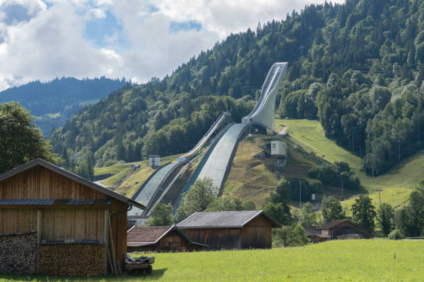 the ski jumping hill at the gudiberg in garmisch-partenkirchen - ski jumping hill imagens e fotografias de stock