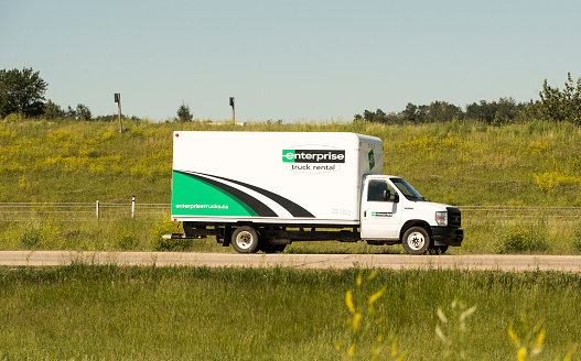 An Enterprise Truck rental vehicle carrying freight north on the Queen Elizabeth Highway near Edmonton, Alberta. Taken on June 27, 2021