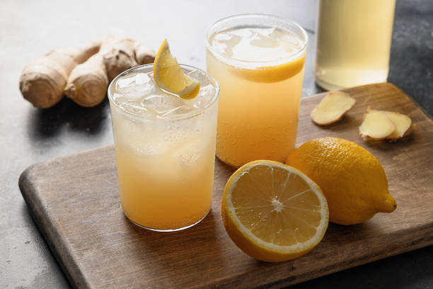Homemade healthy kombucha beverage glasses with lemon.