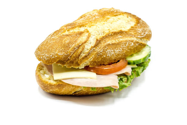 istock Ham baguette isolated on white background 1326479025