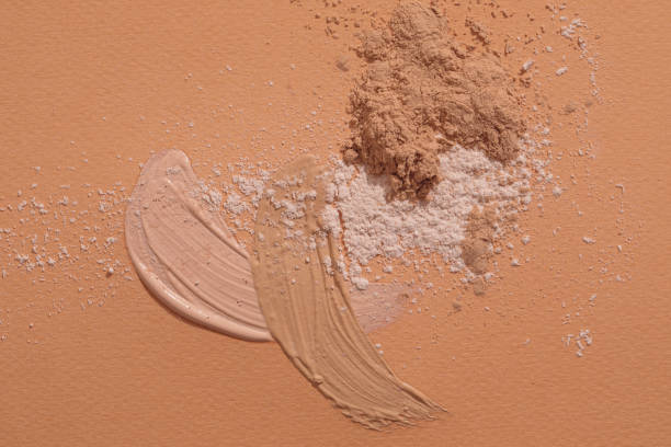 istock Crashed beige face finishing and liquid powder. Macro texture of make-up on beige background 1326479840