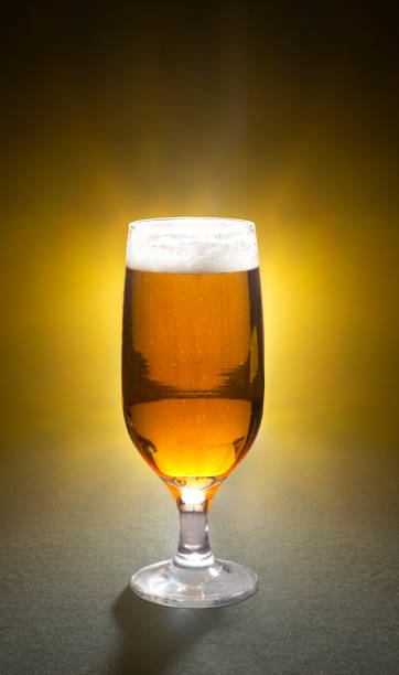 istock Beer glass isolated on a bright yellow background 1326480250