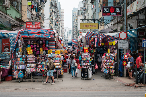HongKong, China - November, 2019: People on street market (Ladie`s Market) in Hong Kong , Tung Choi Street, Mongkok