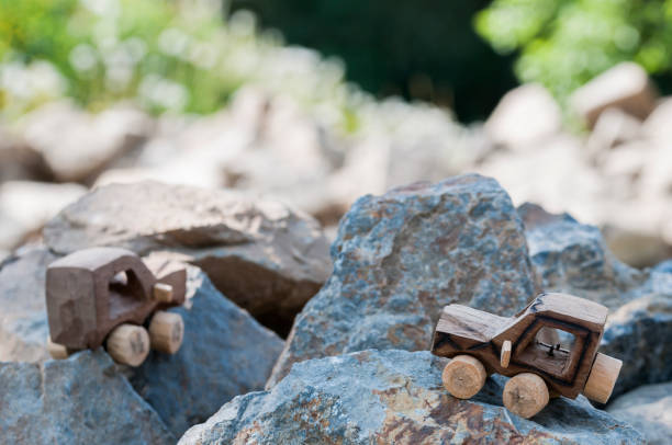 handmade old wooden miniature toy house in background