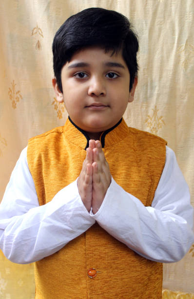 istock Cute Indian child doing Namaste 1326481489