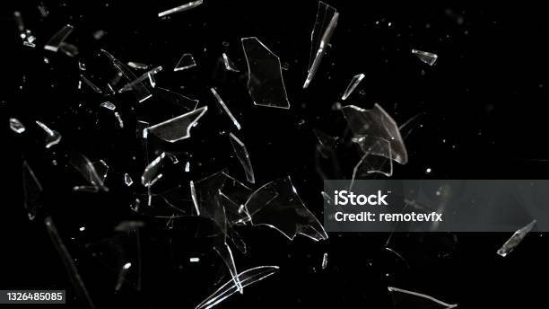 Studio Fullframe Wide Plate Shot Of Real Window Glass Pane Shattering And Breaking On Black Background Stock Photo - Download Image Now