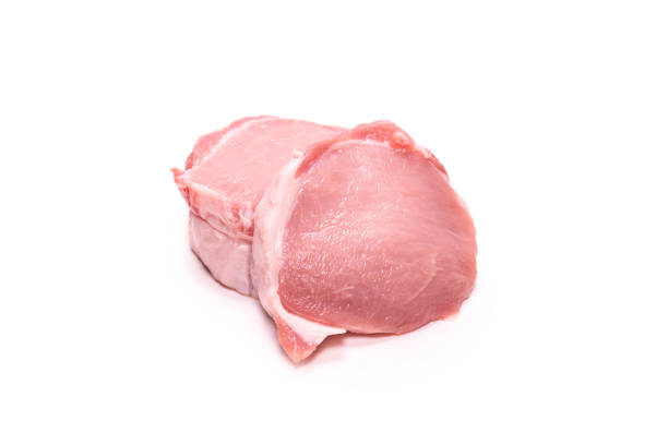 istock Raw pork pieces isolated on a white background. 1326488249