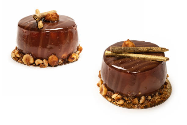 istock Chocolate and caramel cake isolated on a white background. 1326488296
