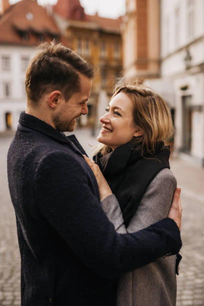 istock Young couple in love telling a joke 1326488754