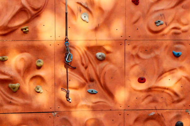 istock fragment of climbing wall for beginners in public park 1326493389