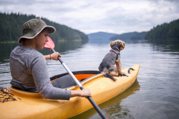 istock Woman Exploring Nature With Her Dog. 1326495988