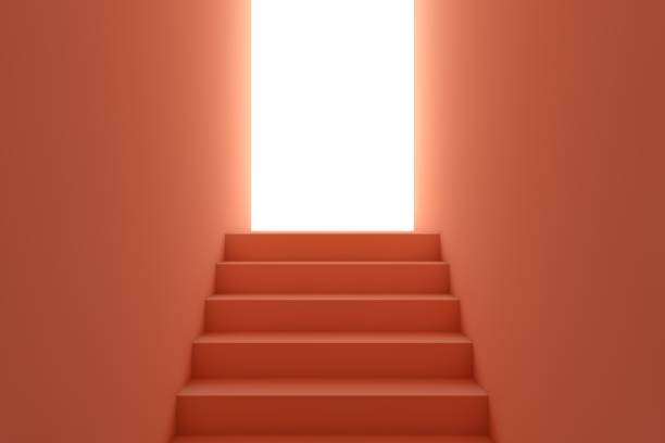 istock Stairway goes up to glowing door 1326497074