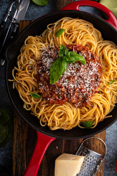 istock Spaghetti Bolognese in a cast iron pan 1326497429