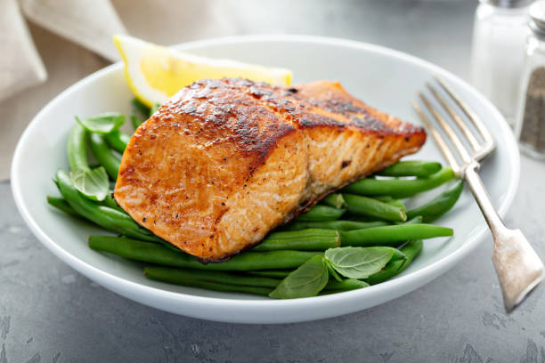 istock Grilled salmon served with green beans 1326498550