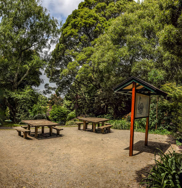 istock A recreation park with sculptures, flowers, paths and bridges. 1326498666