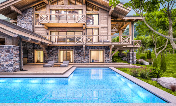 istock 3d rendering of modern cozy chalet in evening 1326499686
