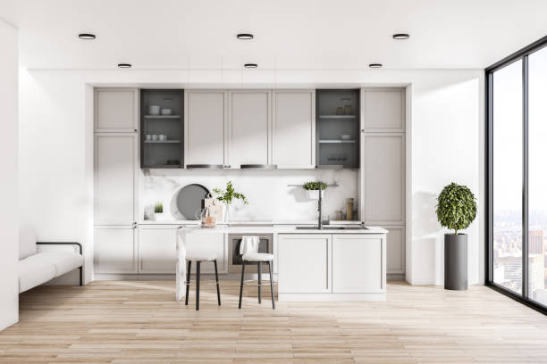 istock Modern kitchen interior with island, appliances, sunlight and city view. Design concept. 3D Rendering. 1326503565