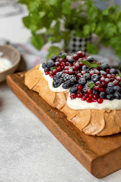 istock Delicious Pavlova cake with fresh berries. 1326505843