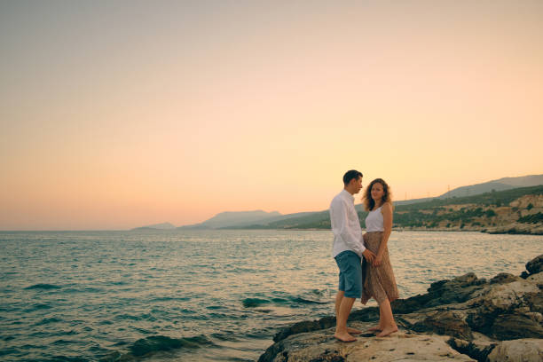 istock Couple on an evening seaside date 1326508977