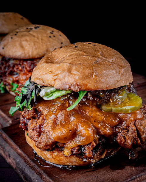 istock Delicious crispy chicken burger on a slab 1326519588