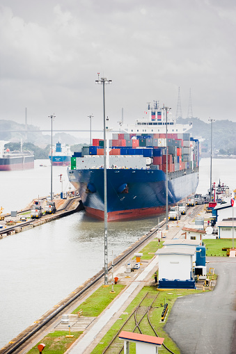 Cargo ship entering the Panama Canal at Miraflores Locks, Panama City, Central America