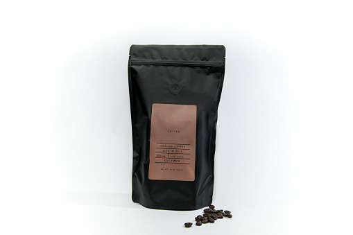 Template Bag of coffee with few coffee beans on the white background