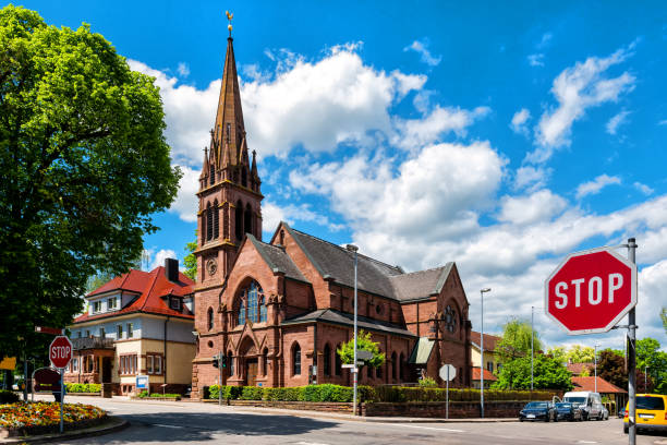 Brick church with dramatic cloud on background in sunrise