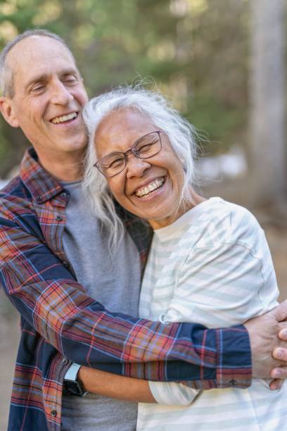 istock Happy senior couple on vacation hiking 1326528503