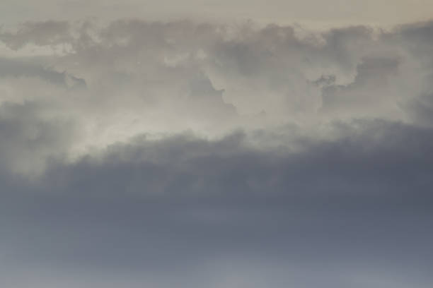 Beautiful sunset sky above clouds with dramatic light, Beautiful blazing sunset landscape, Copy space, Selective focus.