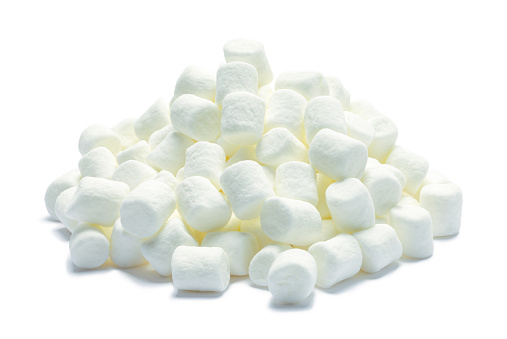 Pile of Mini Marshmellows Cut Out on White.