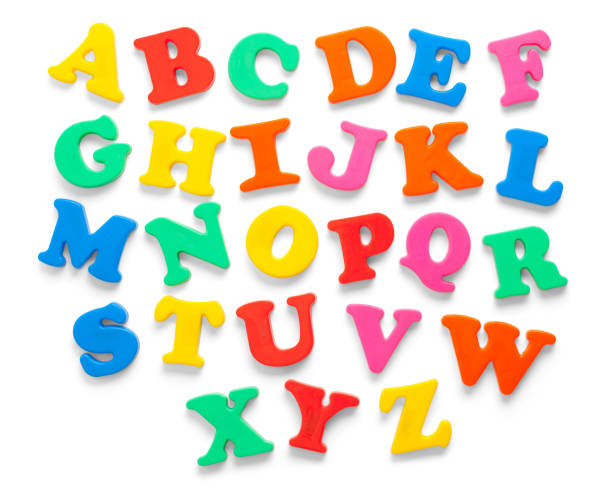 Alphabet Magnets Alphabet Fridge Magnets Cut Out on White. magnet photos stock pictures, royalty-free photos & images