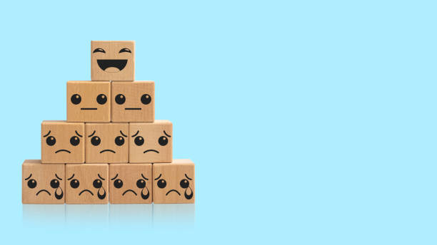 istock Smile face on wood cube. Optimistic person or people feeling inside and service rating when shopping, satisfaction concept in business.With clipping path. 1326547291