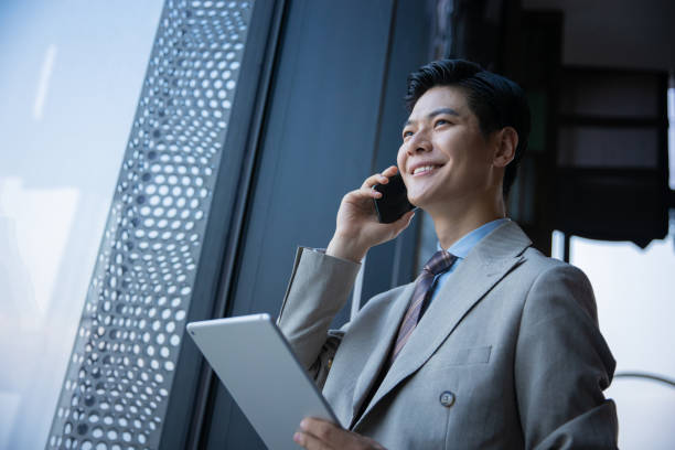 istock Businessman talking on the mobile phone 1326548275